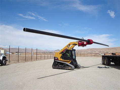 setting poles with skid steer|skid steer pole attachment.